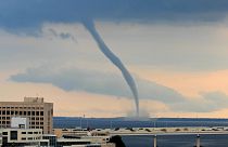 A large waterspout forms above the St. Johns River in Jacksonville, Florida, June 2009.