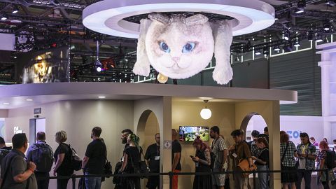 Computer gamers line up at the stand for the game inzoi at the Gamescom computer gaming fair in Cologne, Germany, Wednesday, 21 August 2024. 