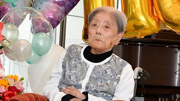 Tomiko Itooka celebrating her 116th birthday at the nursing home she lives in Ashiya, western Japan, on 23 May 2024.