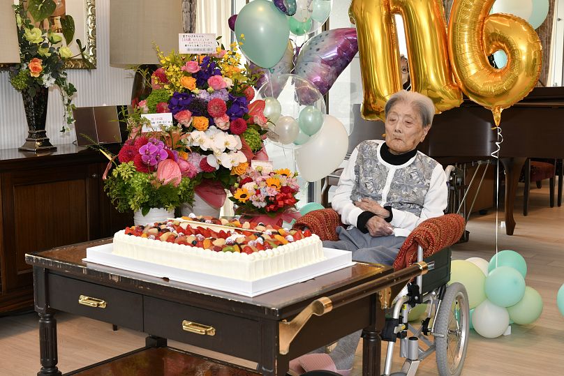 Tomiko Itooka celebrating her 116th birthday at the nursing home she lives in Ashiya, western Japan, on 23 May 2024. 