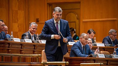 Marcel Ciolacu, the leader of the Social Democratic party, prepares to deliver a speech before a confidence vote for him and his team at the parliament in Bucharest, Romania, 