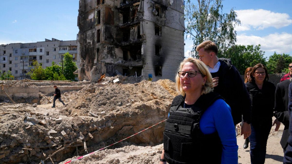 German Development Minister Svenja Schulze visits a destroyed area in Kyiv