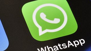 A WhatsApp icon is displayed on an iPhone in Germany, November 15, 2018