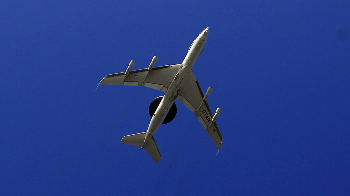 A NATO AWACS plane takes off the NATO Airbase in Geilenkirchen, Germany, Wednesday, March 12, 2014