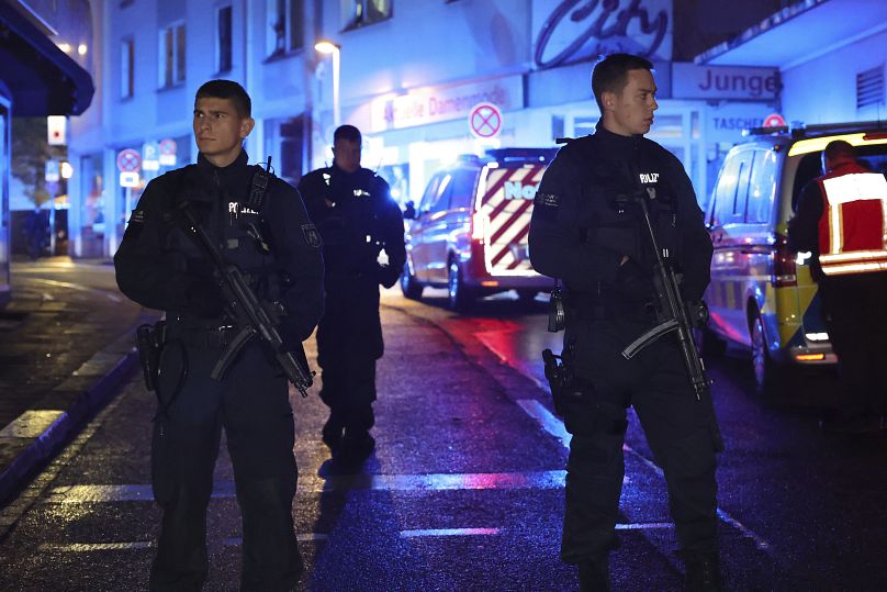 Police and ambulances near the scene where three people were killed in an attack at a festival in Solingen, August 23, 2024