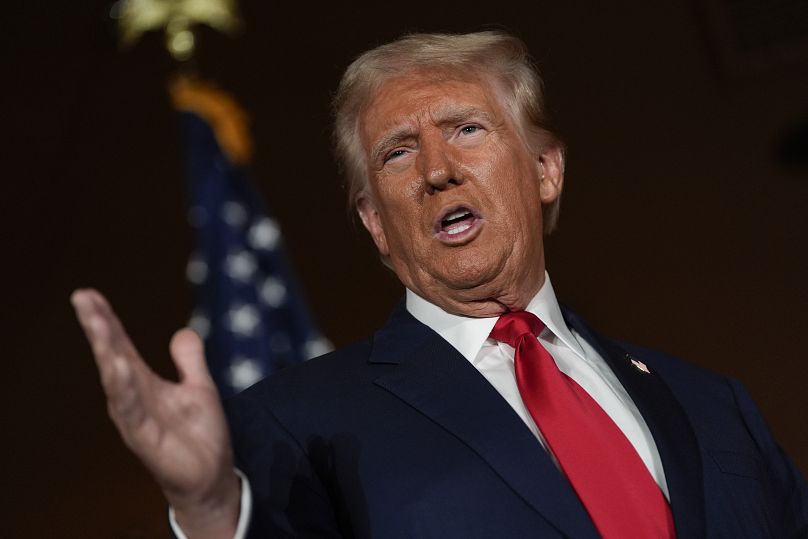 Republican presidential nominee former President Donald Trump talks with reporters at a campaign event in Las Vegas, August 23, 2024