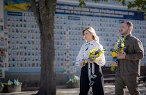 Ukrainian President Volodymyr Zelenskyy and his wife Olena lay flowers at the war memorial in Kyiv during celebration of the Ukraine independence day, 24 August 2024