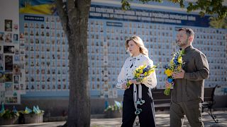 Ukrainian President Volodymyr Zelenskyy and his wife Olena lay flowers at the war memorial in Kyiv during celebration of the Ukraine independence day, 24 August 2024