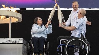 British Paralympians Helene Raynsford and Gregor Ewan light the Paralympic Flame in Stoke Mandeville. Saturday, August 24, 2024.