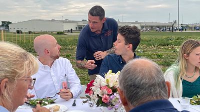 Greg Sigelmier, 40, speaks to attendees at the dinner party inside the Grafton Reintegration Centre on 15 August 2024