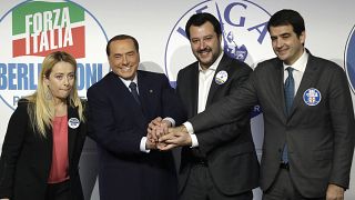 Il nuovo commissario italiano Ue, Raffaele Fitto (a destra), in una foto del 2018 con Giorgia Meloni, Silvio Berlusconi e Matteo Salvini prima delle elezioni politiche