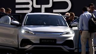 FILE - Visitors look at the Chinese made BYD ATTO 3 at the IAA motor show in Munich, Germany, on Sept. 8, 2023. 