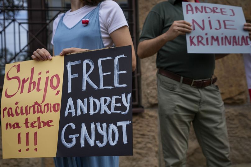 Protests against the extradition of Andrei Hniot to Belarus gather outside the Serbian appeals court in Belgrade on Tuesday, August 27, 2024.