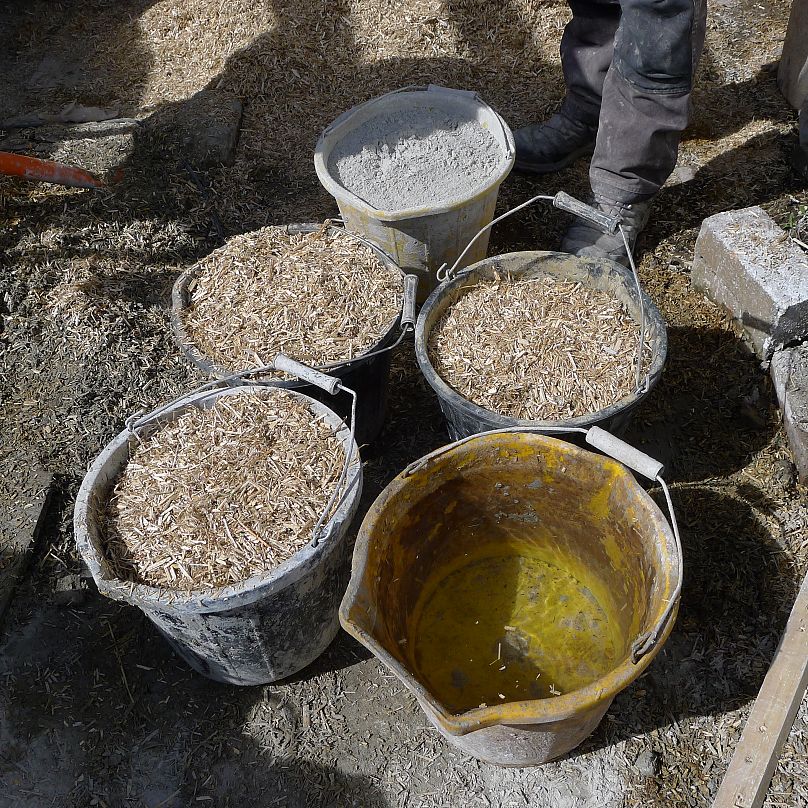 The constituents of hempcrete; hemp shiv, lime binder and water.