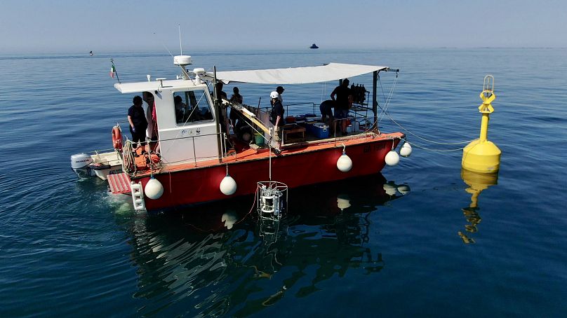 Vessel of National Institute of Oceanography and Applied Geophysics taking samples in the Adriatic 
