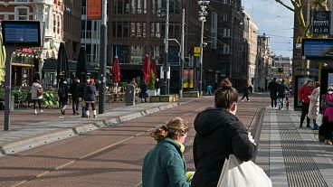 People walking in Amsterdam, The Netherlands.