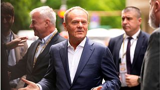 Poland's Prime Minister Donald Tusk arrives for a meeting of the EPP party ahead of an EU summit in Brussels.