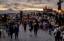 Tourists walk over the Karlsbruecke (Charles Bridge) in Prague, Czech Republic, 18 August 2024. 