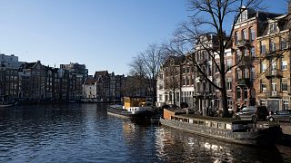 View of the historic center of Amsterdam, Netherlands, Friday, Dec. 16, 2022. (AP Photo/Peter Dejong)