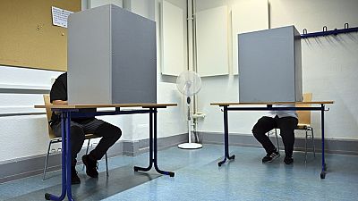 Voters cast their ballots at a polling station in Erfurt, Germany, on Sunday 1 September 2024