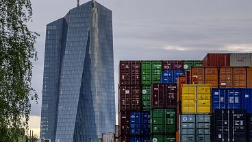 The European Central Bank pictured next to containers in Frankfurt, Germany