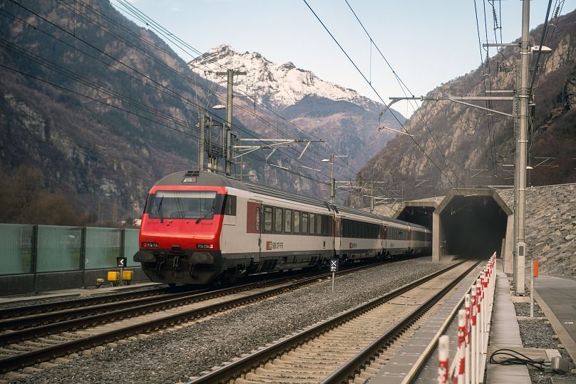 A passenger train enters the south portal of the Gotthard rail tunnel between Erstfeld and Pollegio, December 11, 2016