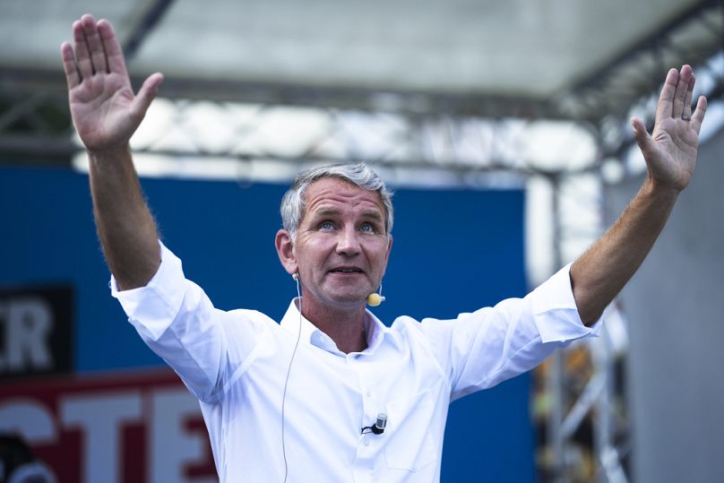 Björn Höcke top candidate in Thuringia of the far-right AfD party waves to supporters during an election campaign rally in Suhl, Germany, Aug. 13, 2024