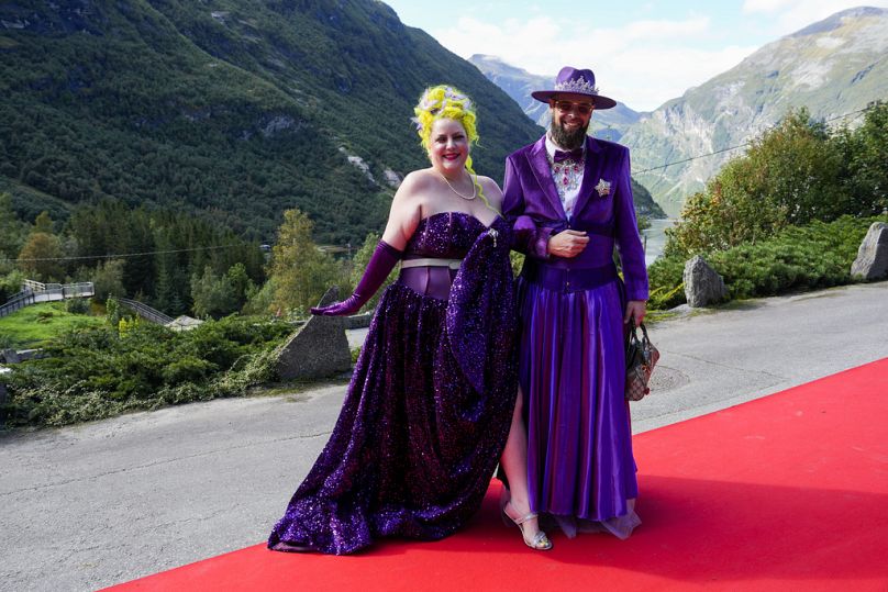 Artists Margie Plus and Harald Austad attend the wedding of Norway's Princess Martha Louise and Durek Verrett, in Geiranger, Norway, Saturday Aug. 31, 2024.