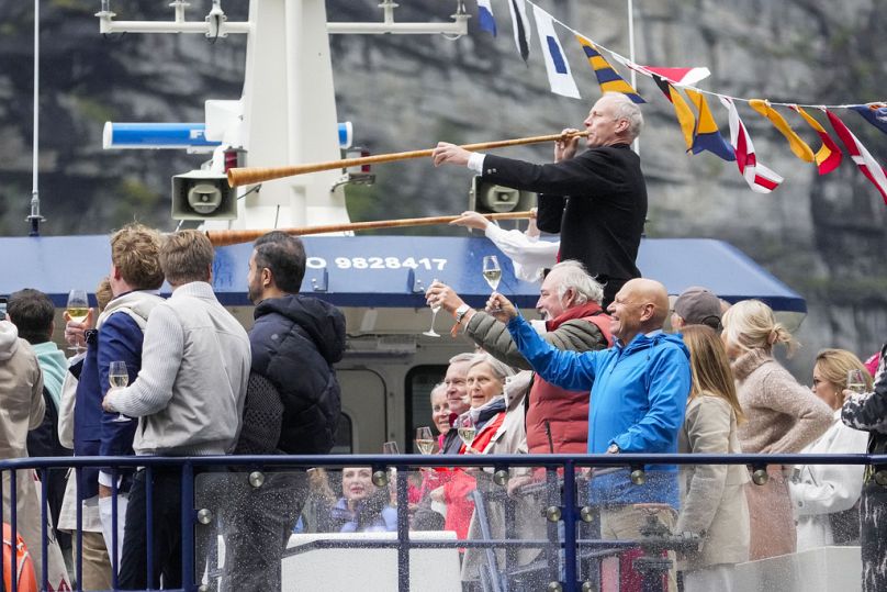 Guests are transported by boat from Alesund to Geiranger, Norway, Friday Aug. 30, 2024, for the wedding celebration of Princess Martha Louise and Durek Verret.