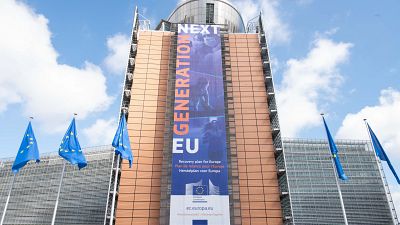 The banner "Recovery Plan for Europe" on the front of the Berlaymont building, Brussels.