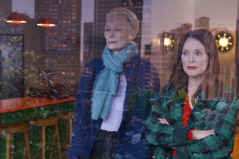 Julianne Moore, right, and Tilda Swinton in a scene from 'The Room Next Door'