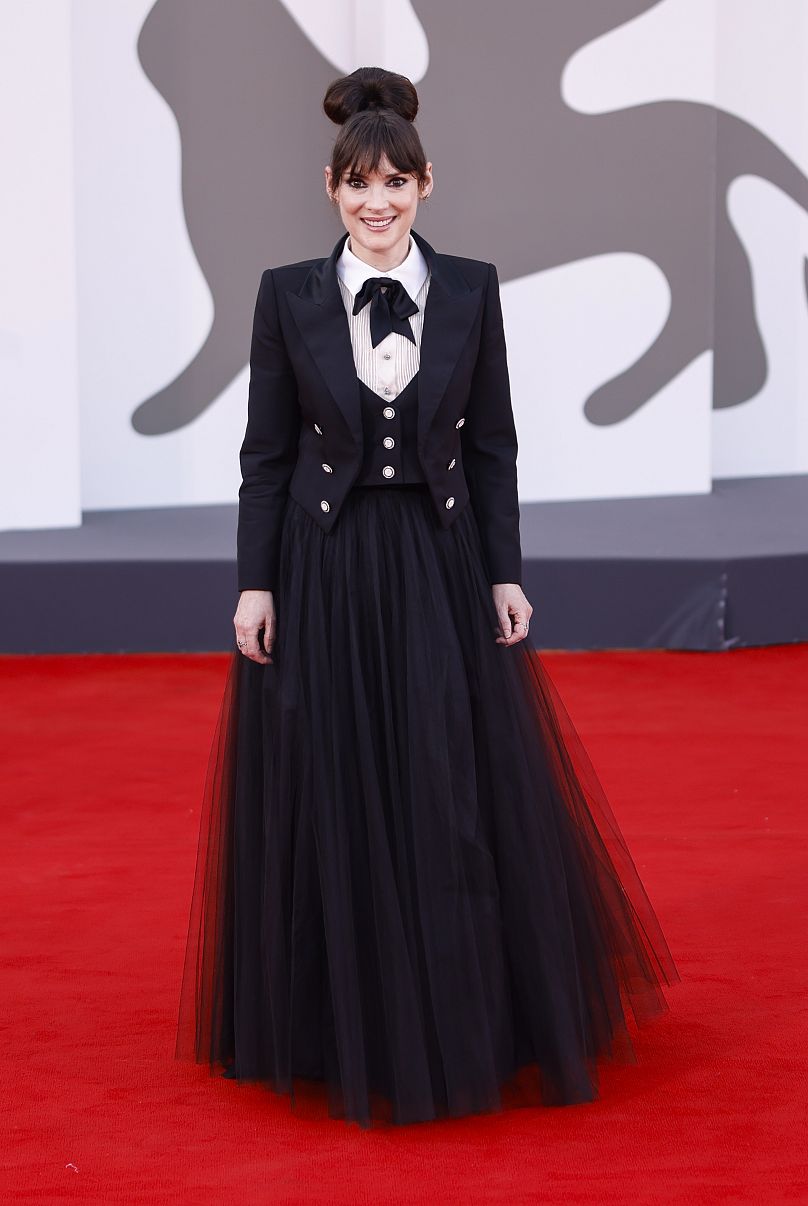 Winona Ryder poses for photographers upon arrival for the premiere of the film 'Beetlejuice Beetlejuice'