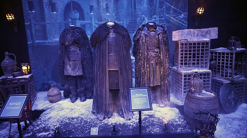 Costumes from the characters Alliser Thorne and Jon Snow on display at the launch of The Game of Thrones Touring Exhibition at the Titanic Exhibition centre in Belfast.