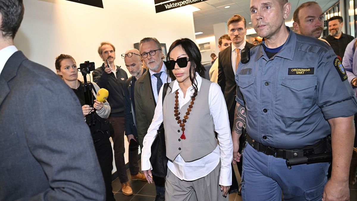 Bella Nilsson, managing director for the garbage disposal company, Think Pink, arrives to Attunda District Court in Stockholm, Sweden.