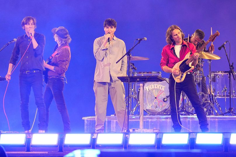 Ezra Koenig and Phoenix perform during the 2024 Summer Olympics closing ceremony