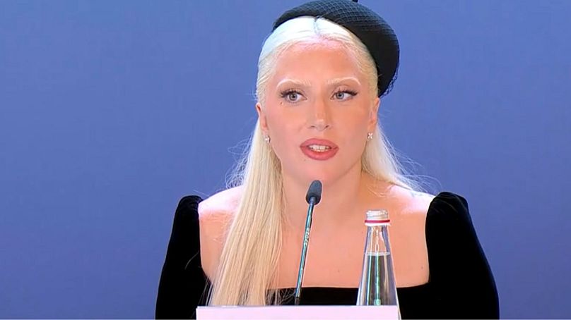 Lady Gaga speaking at a press conference for Joker: Folie à Deux