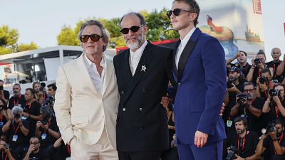 Daniel Craig and Rachel Weisz bring glamour to the red carpet in Venice