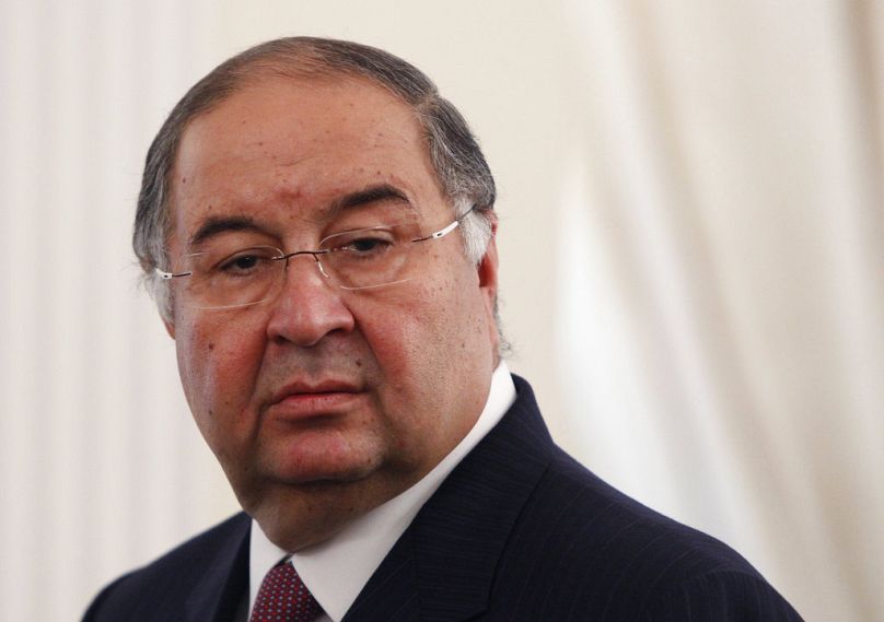 In this Thursday, Sept. 12, 2013 file photo, Uzbek-born Russian businessman Alisher Usmanov attends a meeting of Russian President Vladimir Putin.