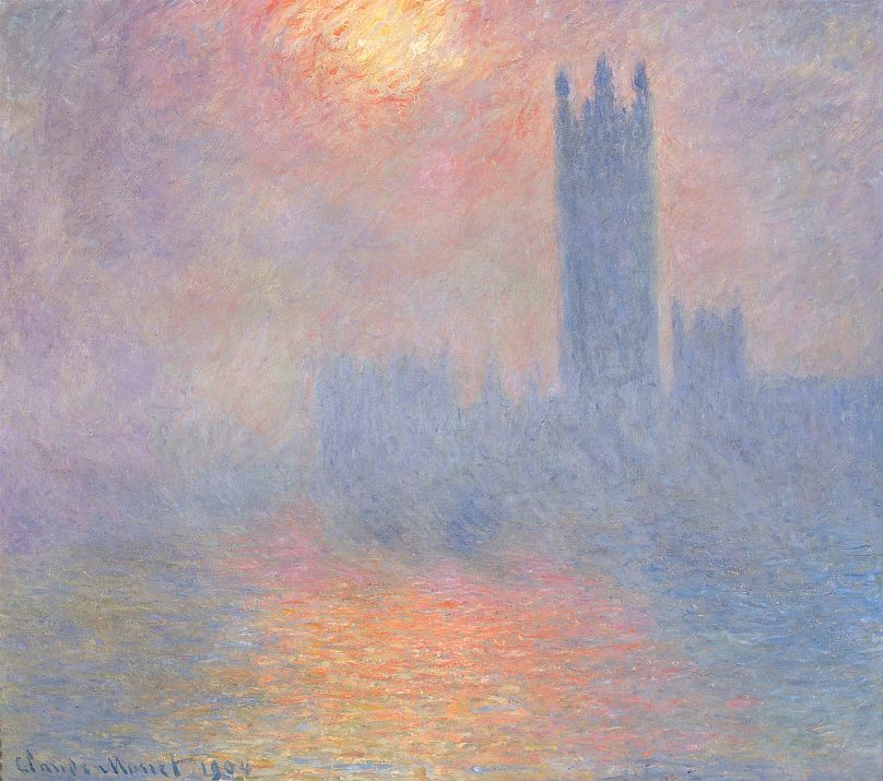 Londres, Parlamento. Luz do sol na névoa (1904) de Claude Monet