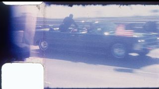 Rare, previously unseen 8 mm home film footage of President John F. Kennedy’s motorcade, captured shortly after he was fatally wounded, will be auctioned by RR Auction. 