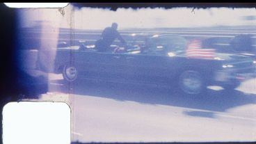 Rare, previously unseen 8 mm home film footage of President John F. Kennedy’s motorcade, captured shortly after he was fatally wounded, will be auctioned by RR Auction. 