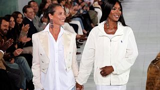 Christy Turlington, left, and Naomi Campbell walk the runway during the Ralph Lauren Spring/Summer 2025 fashion show.