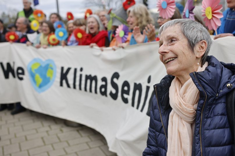 Switzerland's Anne Mahrer, co-president of KlimaSeniorinnen, reacts as Swiss retirees demonstrate outside the European Court of Human Rights,