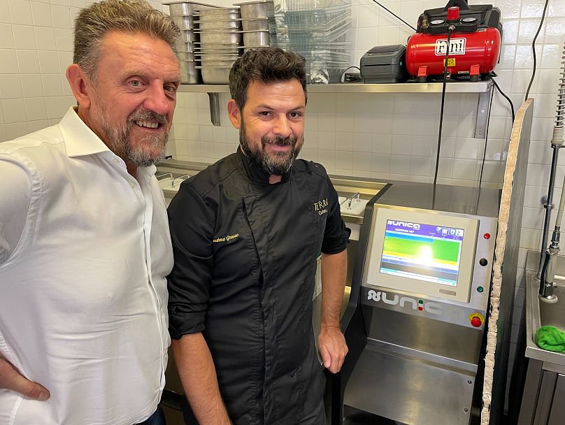 Gianfranco and Massimo next to the crucial ingredients controlling computer