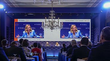 Giorgia Meloni speaking at the economic forum