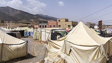 Tents set up by people who were affected by the 2023 earthquake, in the town of Amizmiz, outside Marrakech, Morocco, Wednesday, Sept. 4, 2024. 