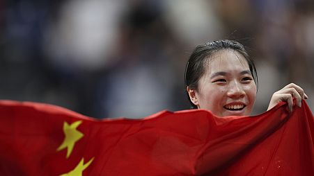 China's Huang Wenjuan celebrates after winning the Women's Singles WS8 Gold Medal Match against Norway's Aida Husic Dahlen during the 2024 Paralympics, Saturday, Sept. 7, 2024