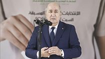 Algerian President Abdelmajid Tebboune speaks nside a polling station during the presidential elections, Saturday, Sept. 7, 2024, in Algiers, Algeria. 