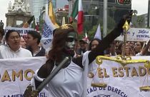 Protest against proposed changes to the legal system in Mexico.