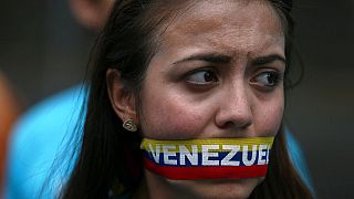 Image d'une électrice vénézuélienne lors d'une manifestation contre le gouvernement de Nicolas Maduro.